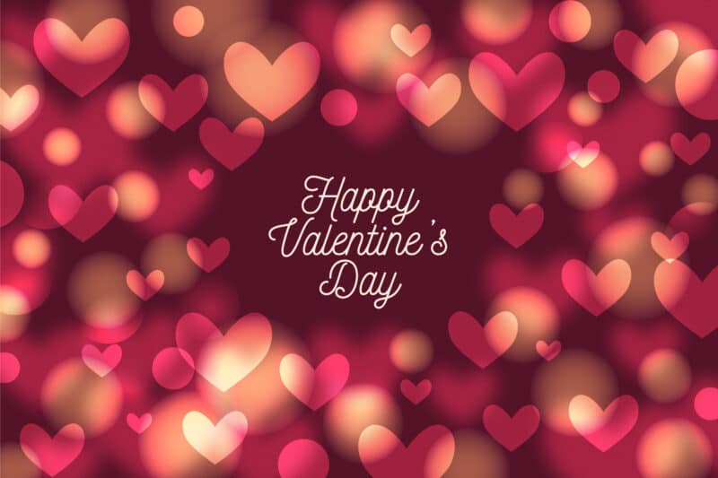 Multi-color heart background with words "Happy Valentine's Day"