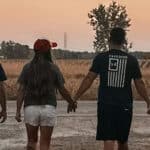 Family walking away down driveway
