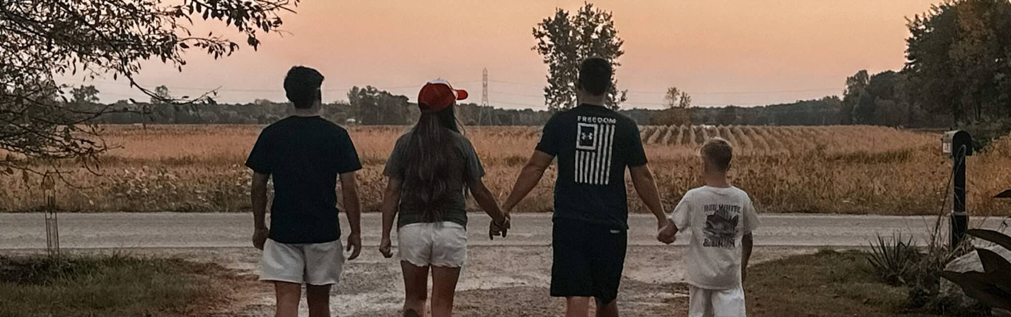 Family walking away down driveway