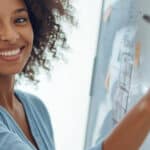 photo of african american woman at white board